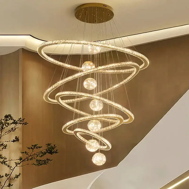 Golden spiral decorbites crystal chandelier with crystal-encrusted rings and spherical lights for indoor living room lighting