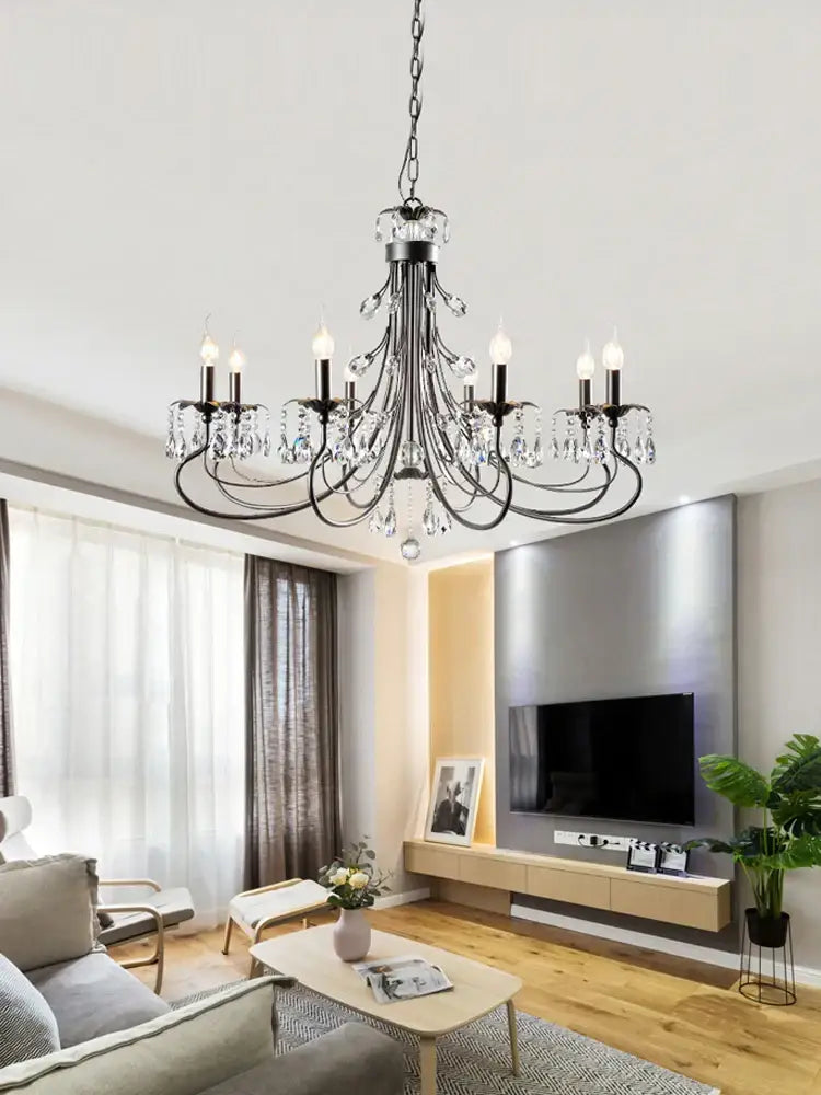 Black wrought iron DecorBites crystal chandelier with dangling crystals and E14 candle bulbs for living room lighting