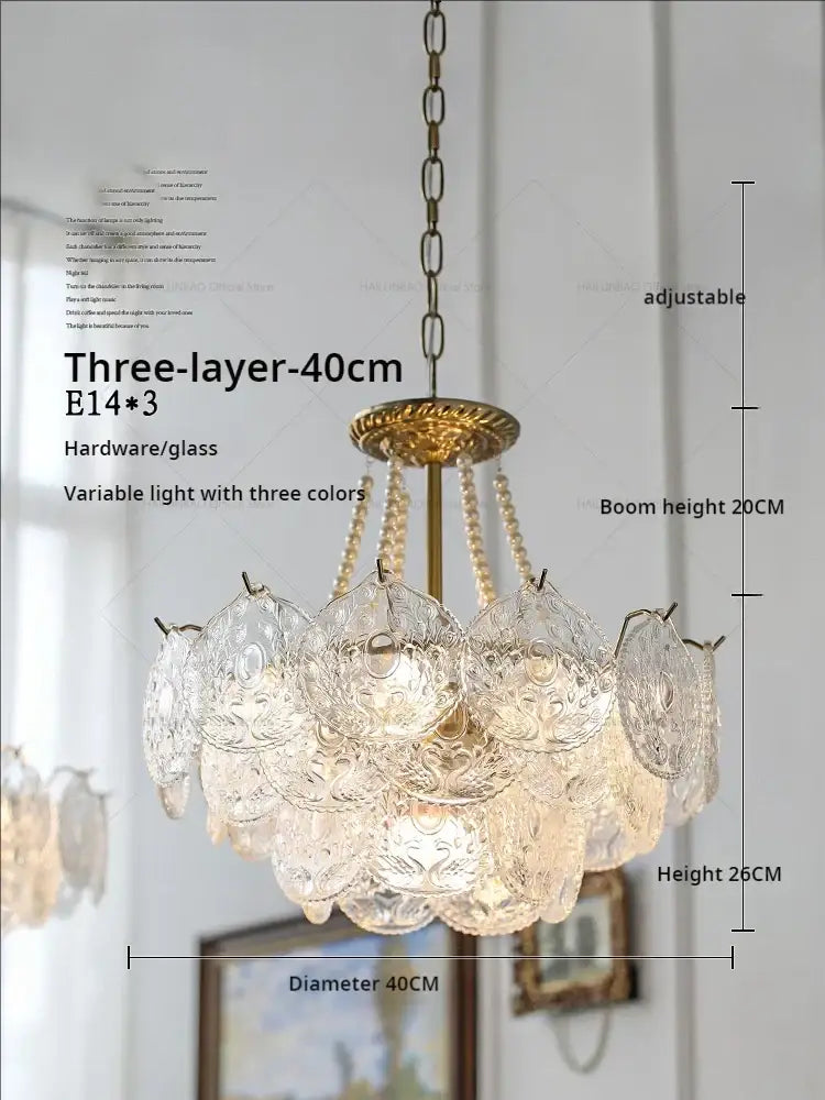 A three-layer 40cm decorbites crystal chandelier with clear etched glass shades and brass-finished metal frame for elegant decor