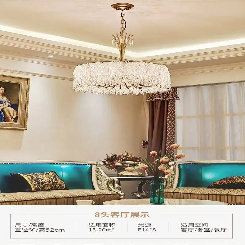 Luxurious decorbites crystal chandelier with gold-toned frame and cascading clear crystals for modern elegant living spaces
