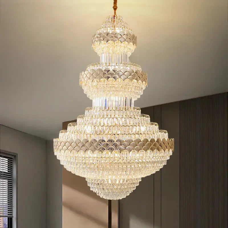 DecorBites crystal chandelier with multi-tiered golden finish and cascading faceted glass for modern loft lighting