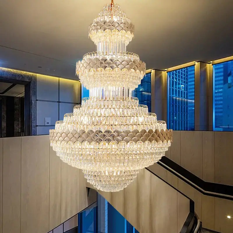 Decorbites crystal chandelier with cascading clear and frosted glass prisms in modern duplex loft staircase lighting