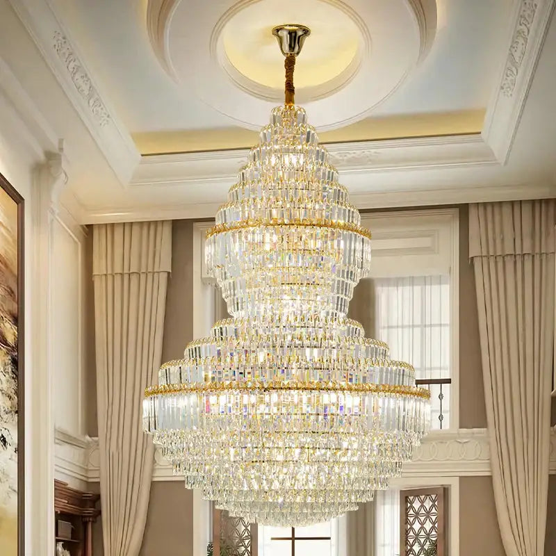 A decorbites crystal chandelier with gold-toned accents and clear faceted crystals for modern loft lighting