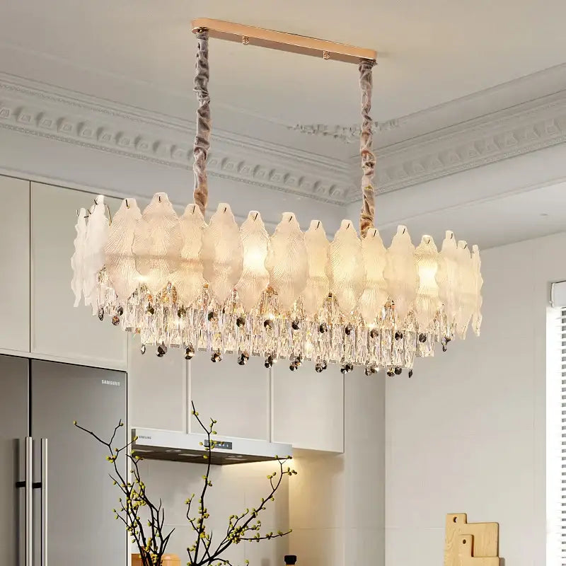 Elegant oval decorbites crystal chandelier with frosted glass leaf shades and crystal droplets for modern elegance lighting