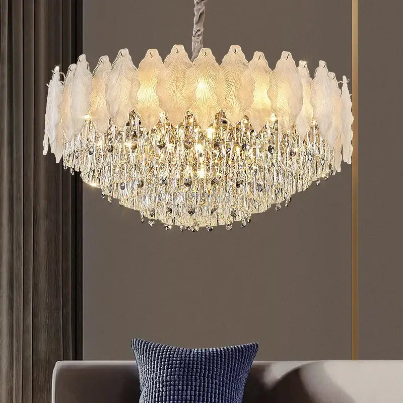 Elegant white feather-shaped decorbites crystal chandelier with cascading crystal droplets and gold-toned accents for modern elegance