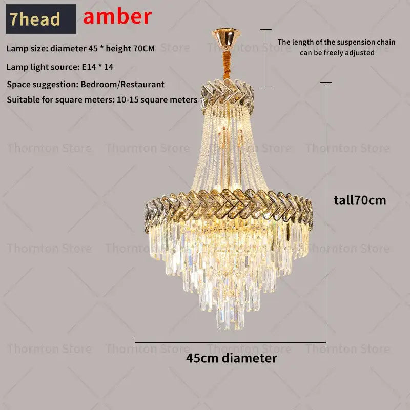 Elegant amber-toned seven-head decorbites crystal chandelier with gold metalwork and cascading glass prisms for luxury stair lighting