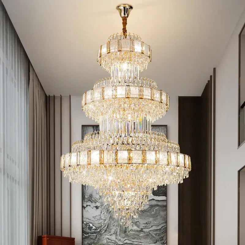 DecorBites crystal chandelier with gold-toned accents and cascading clear glass prisms for modern loft lighting