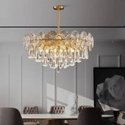 DecorBites crystal chandelier in gold tone with intricate petal-shaped and cascading teardrop crystal discs