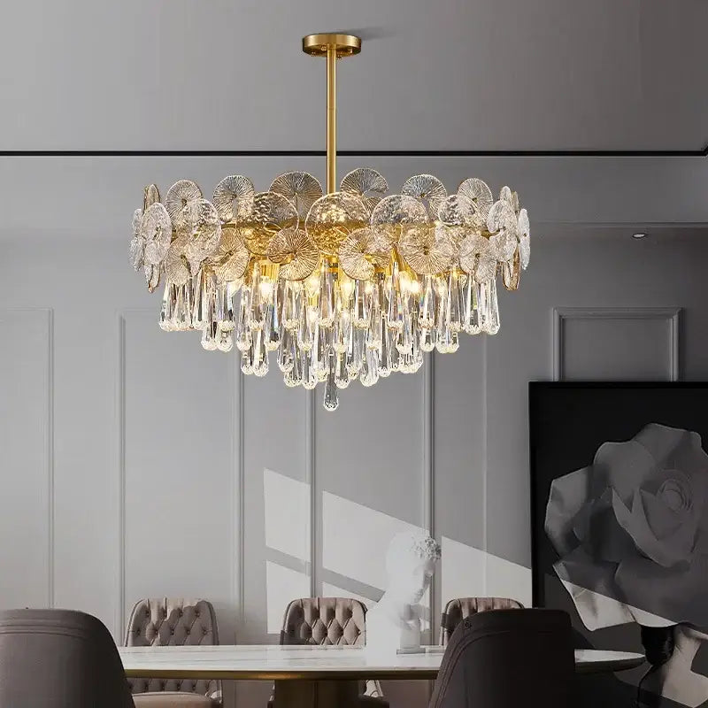 DecorBites crystal chandelier in gold tone with intricate petal-shaped and cascading teardrop crystal discs