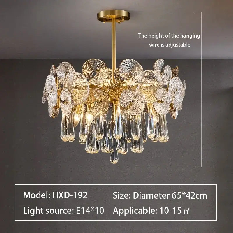 Gold-finished decorbites crystal chandelier with clear petal-shaped glass discs and dangling crystal teardrops for living room