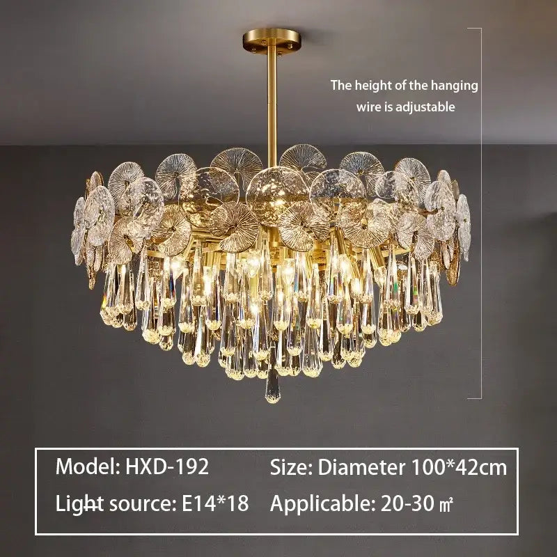 Gold-toned decorbites crystal chandelier with crystal disc and teardrop pendant elements for living room lighting