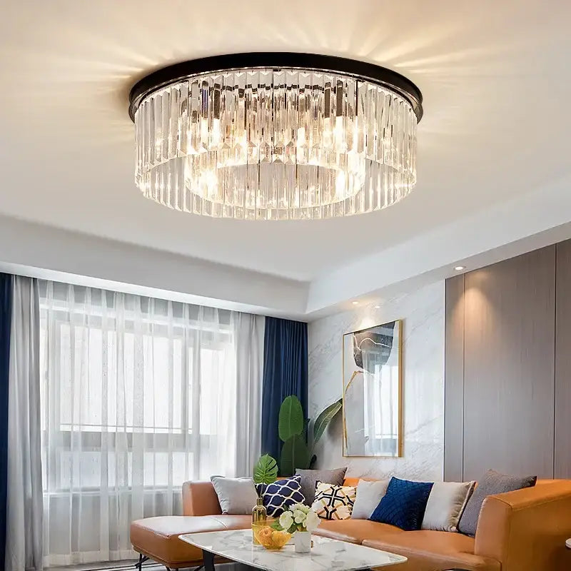 Circular black metal frame decorbites crystal chandelier with cascading clear glass prisms for modern indoor lighting