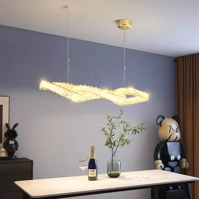Golden infinity-shaped decorbites crystal chandelier with sparkling crystal-encrusted design for dining and living rooms