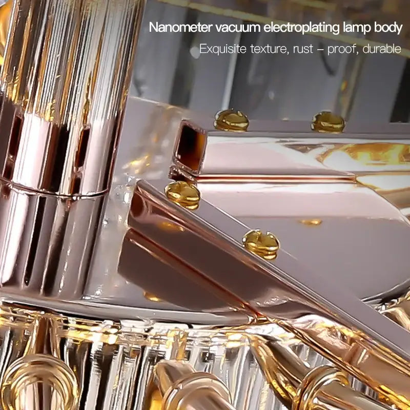 The decorbites crystal chandelier features a sleek gold finish with intricate ridges and polished metallic accents
