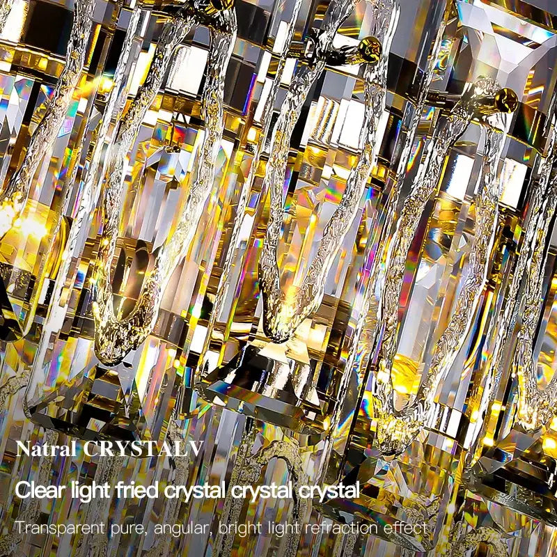 Elegant decorbites crystal chandelier with clear angular prisms and gold-toned metal accents for luxury interiors