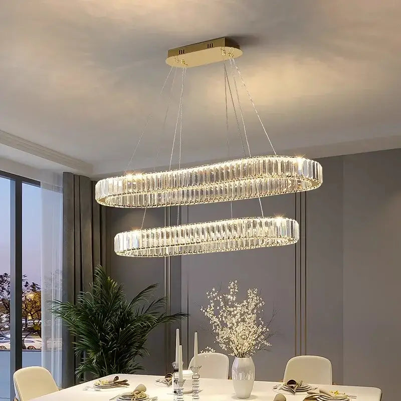Modern decorbites crystal chandelier with double-ring clear crystal rods and gold-toned ceiling mount for living room