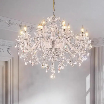 Decorbites crystal chandelier with multiple arms and hanging crystals on a gold-toned metal frame for living room decor