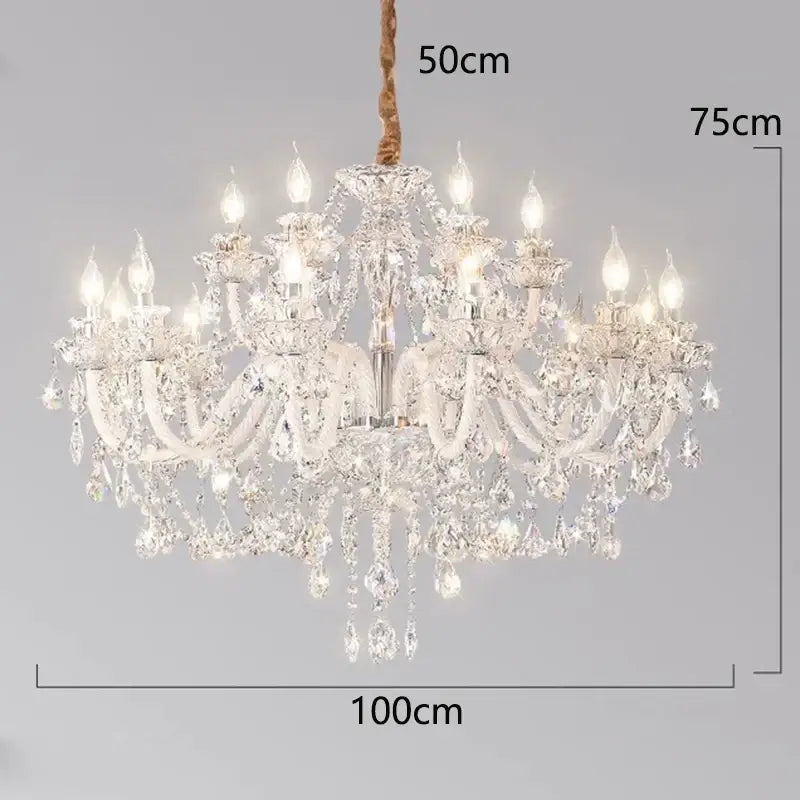 A decorbites crystal chandelier with multiple arms and hanging teardrop crystals suspended by braided rope
