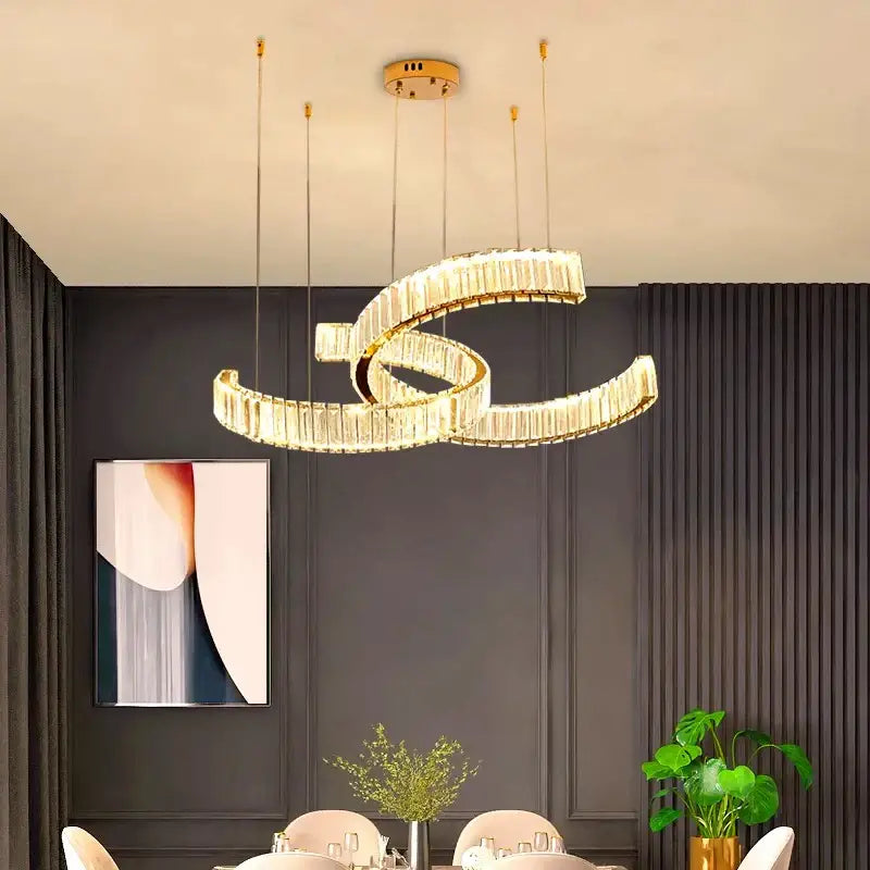 Decorbites crystal chandelier gold-toned pendant light with sleek spiral design and crystal accents for modern interiors