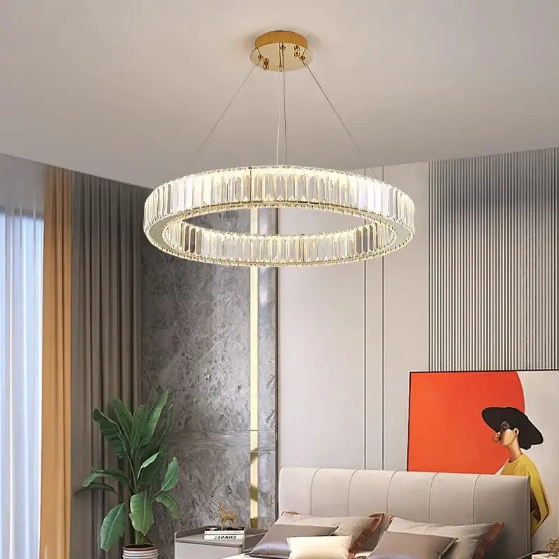 Modern decorbites crystal chandelier with double-ring clear crystal segments and gold-toned ceiling mount for dining room lighting