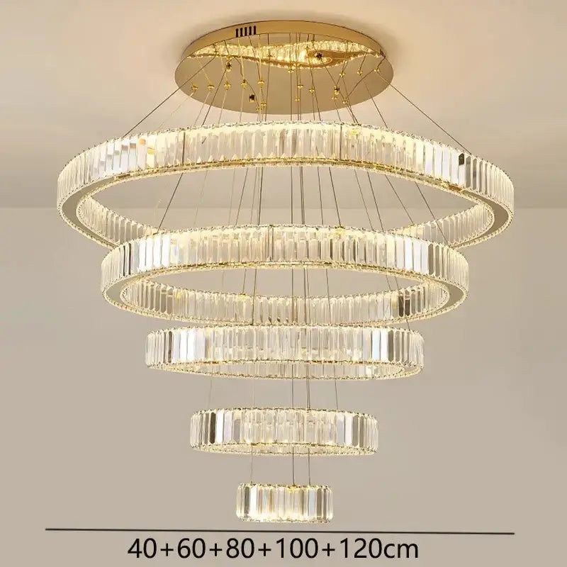 Decorbites crystal chandelier with multi-tiered faceted clear crystals and gold-toned mount for home and dining rooms