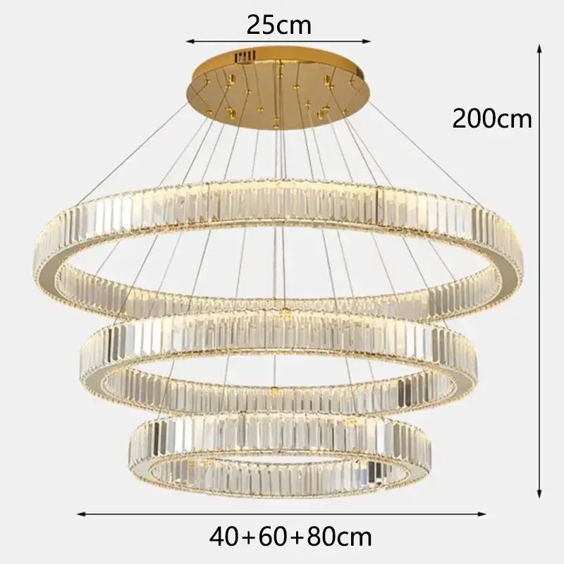 Gold-toned decorbites crystal chandelier with three stacked circular tiers of faceted crystal rods for dining rooms