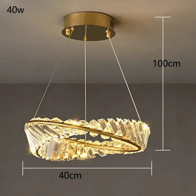A modern gold-toned decorbites crystal chandelier with circular tiers of faceted clear crystals for living room lighting