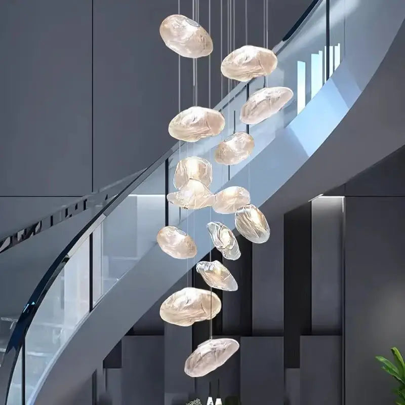 A modern DecorBites crystal chandelier with translucent glass orbs in a cascading design for living room lighting
