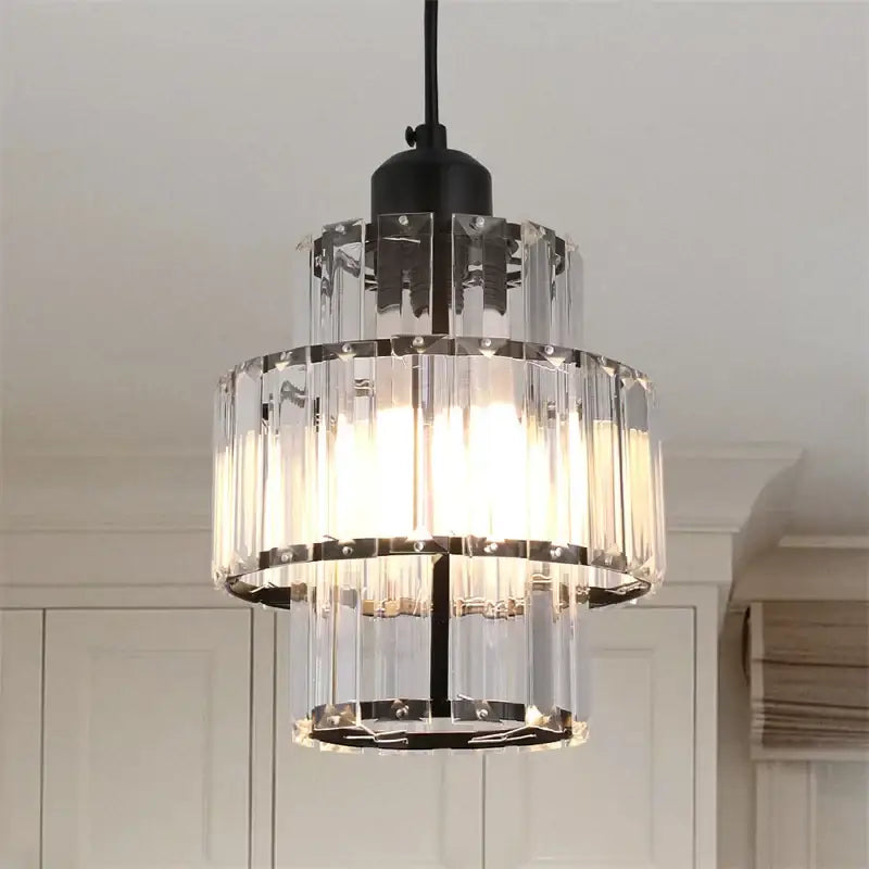 DecorBites crystal chandelier with clear tiered glass rods and black metal frame for modern living room lighting