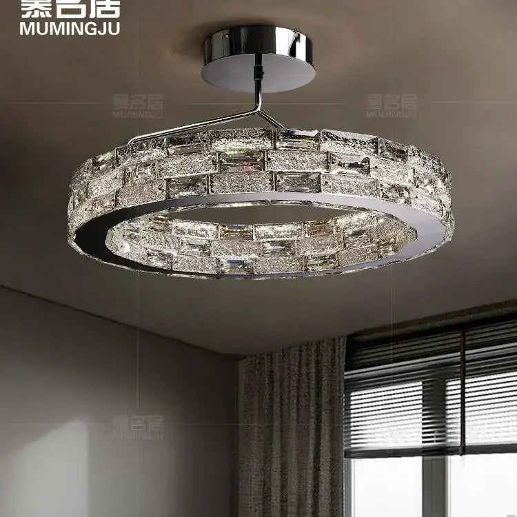 Modern chrome-finished decorbites crystal chandelier with two concentric rings of faceted crystal blocks for ceiling lighting