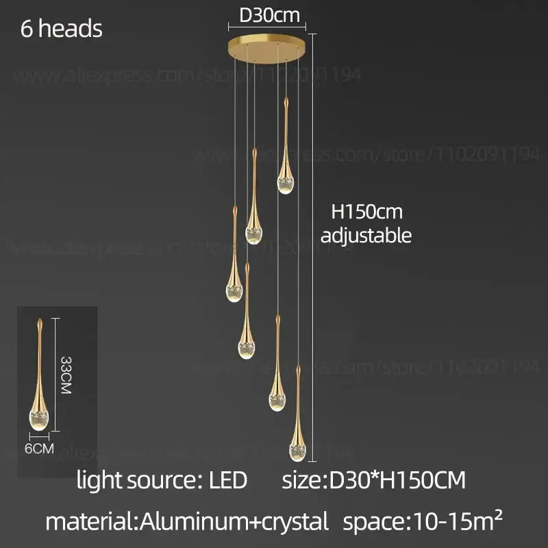 Gold-toned decorbites crystal chandelier with six teardrop crystal lights suspended from aluminum ceiling mount