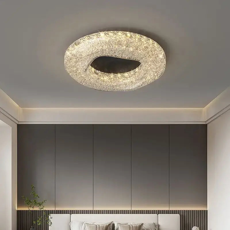 Decorbites crystal chandelier modern circular ceiling light with textured sparkling gold finish and dark irregular center