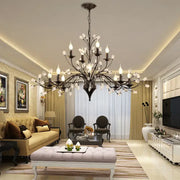 Black wrought iron decorbites crystal chandelier with clear crystal accents and exposed bulbs for modern vintage lighting