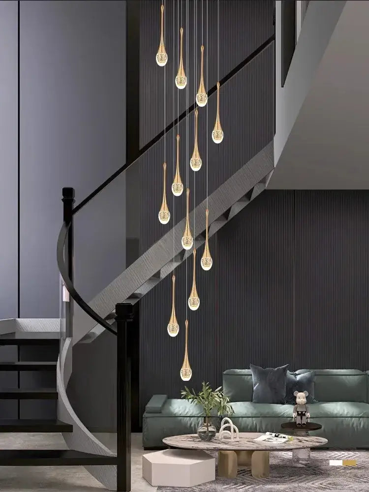 Decorbites crystal chandelier with golden teardrop LED pendant lights and embedded crystals for modern villa living room