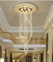 A decorbites crystal chandelier with cascading clear glass beads and embedded LED lights for elegant villa halls