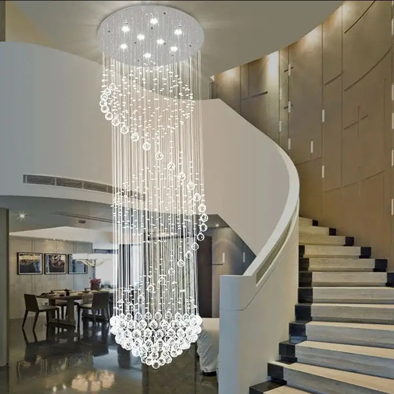 A modern circular decorbites crystal chandelier with cascading crystal droplets and embedded LED lights for living rooms