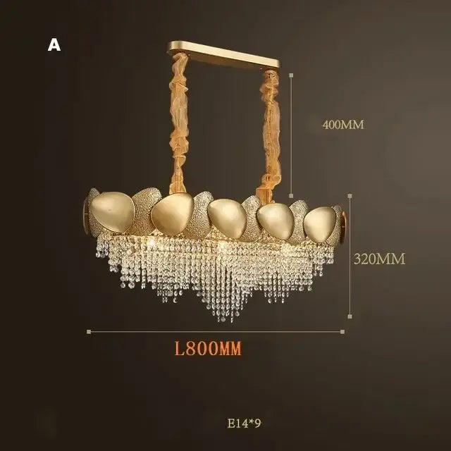Gold-toned decorbites crystal chandelier with ornate egg-shaped metallic orbs and cascading crystal droplets for living room