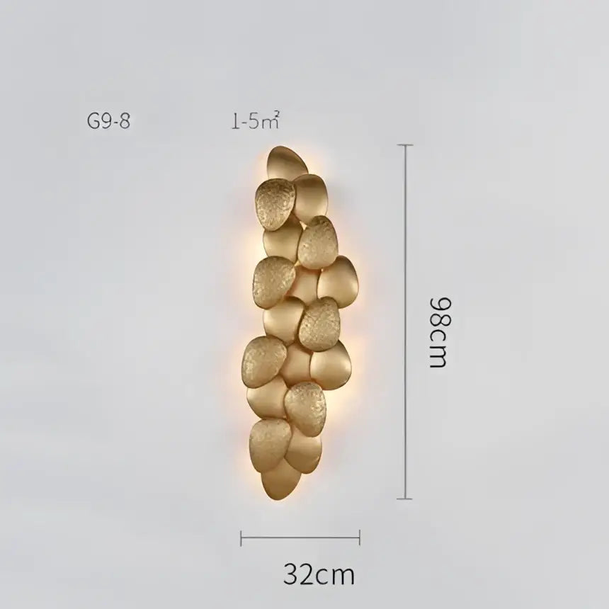 Gold-toned textured stone-like wall sconce with modern stacked design for decorbites crystal chandelier collection