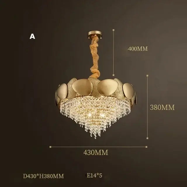 Gold-toned decorbites crystal chandelier with sculptural leaf design and cascading crystal droplets for living room lighting