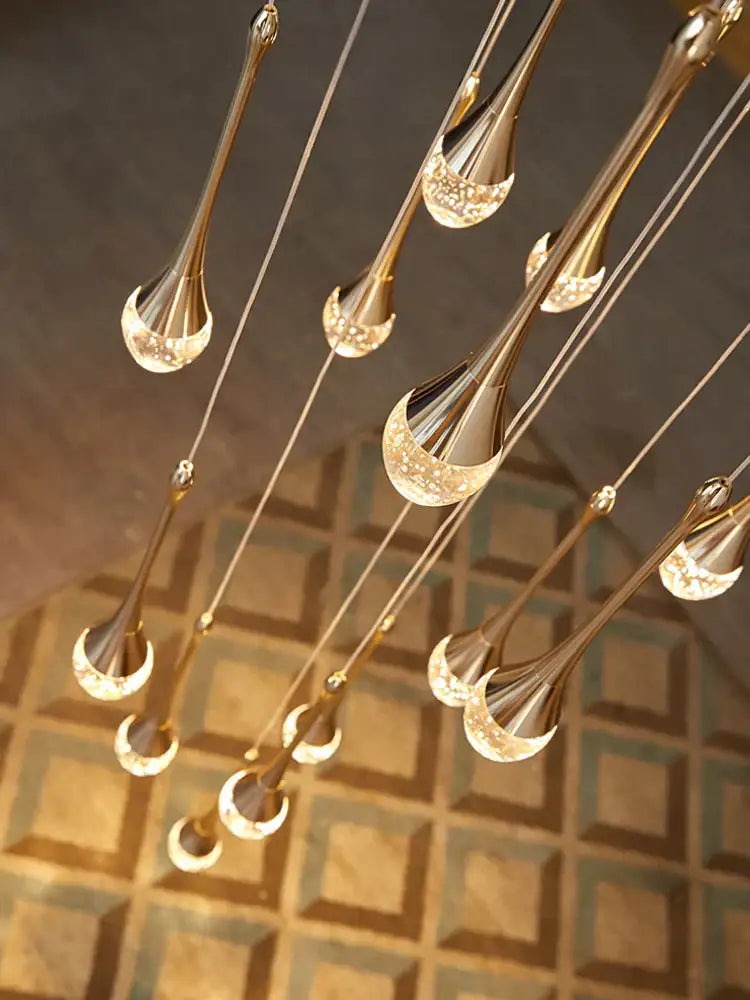 Golden teardrop-shaped decorbites crystal chandelier with crystal accents modern led staircase lighting