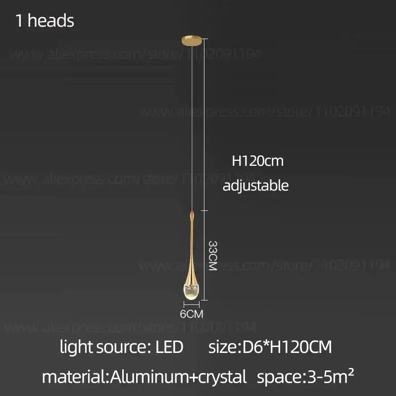 Gold-toned decorbites crystal chandelier with sleek teardrop crystal glass shade suspended from aluminum fixture
