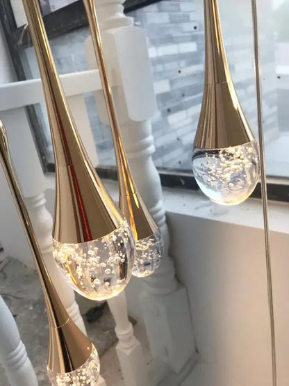 Golden teardrop shaped pendant lights with clear glass bubbles in decorbites crystal chandelier modern led design