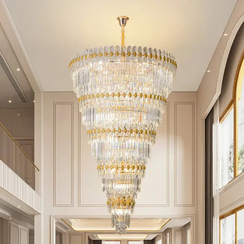 Decorbites crystal chandelier with gold accents and cascading clear glass prisms for modern light luxury