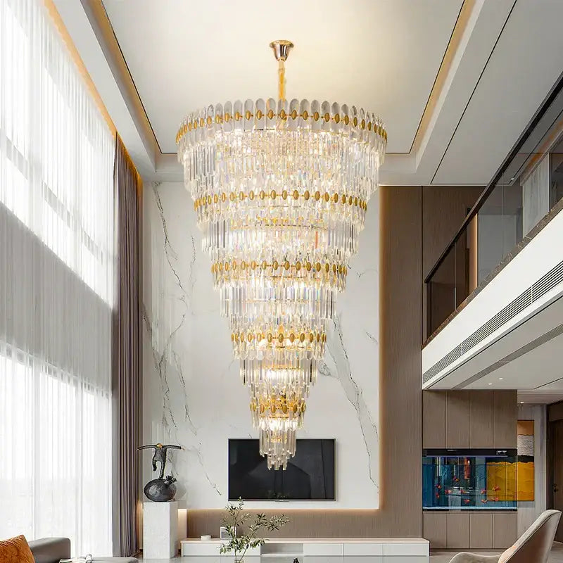 Decorbites crystal chandelier with gold accents and cascading clear glass prisms for living room and bedroom luxury lighting