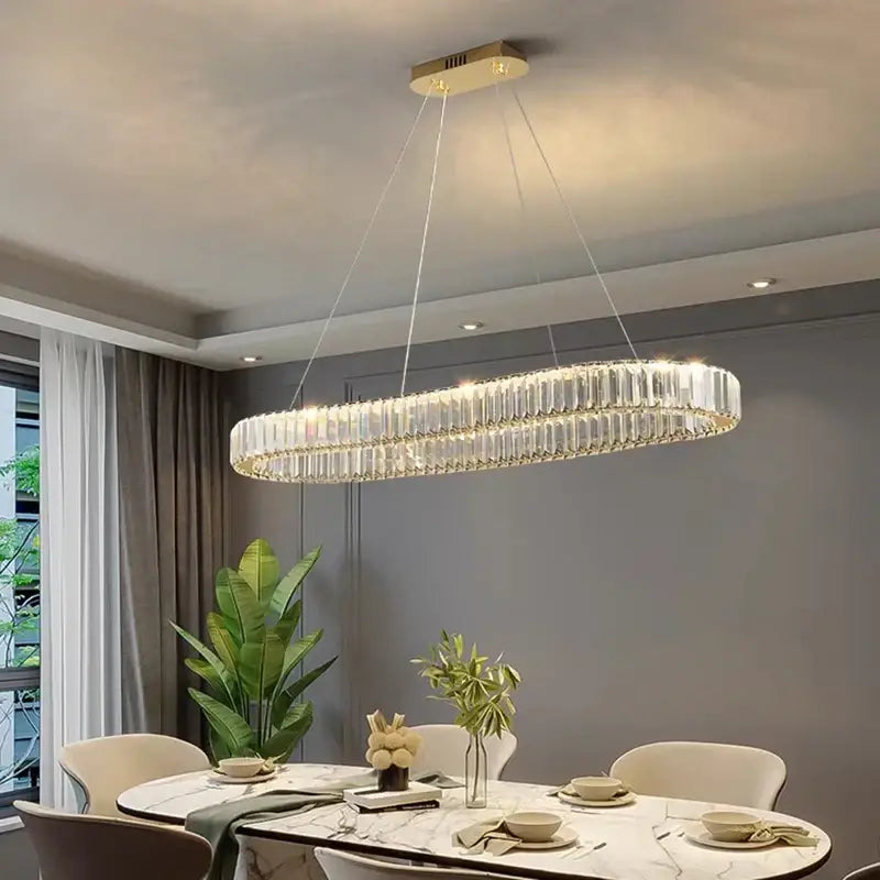 DecorBites crystal chandelier with oval crystal design, gold-toned ceiling mount, ideal for modern living and dining rooms
