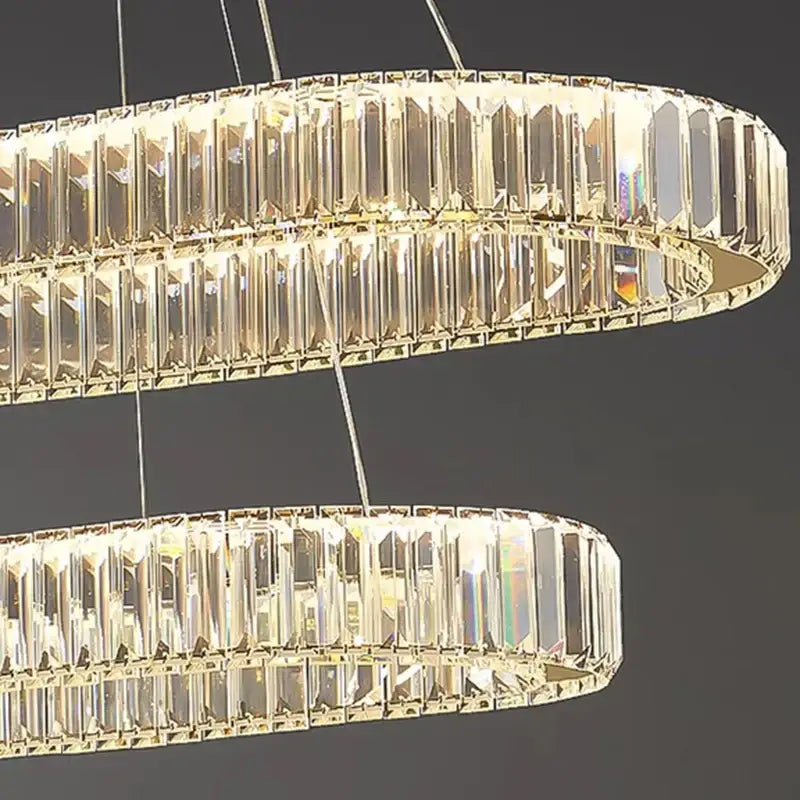 DecorBites crystal chandelier with clear faceted crystal rods and gold metal accents for modern living and dining rooms