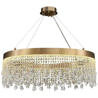 Gold-toned decorbites crystal chandelier with cascading clear crystal droplets and sleek metallic frame for modern living rooms