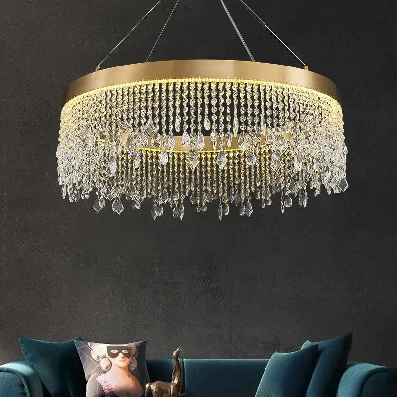 Gold-toned decorbites crystal chandelier with cascading clear crystal droplets for modern living room and kitchen pendant lighting