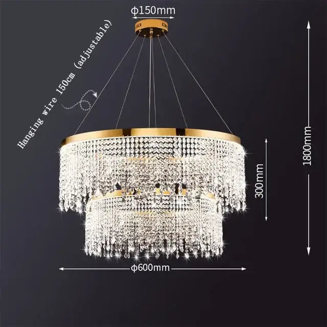 Gold-toned decorbites crystal chandelier with tiered clear crystal droplets and circular brass fixture for modern living spaces