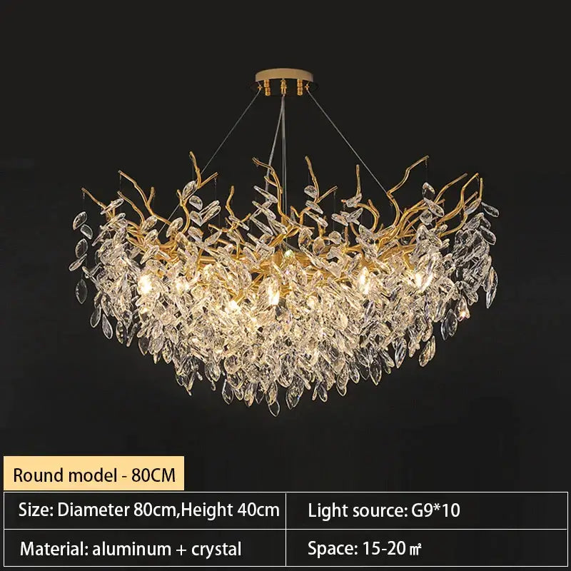 Gold-toned decorbites crystal chandelier with intricate crystal leaf and branch design made from aluminum and crystal